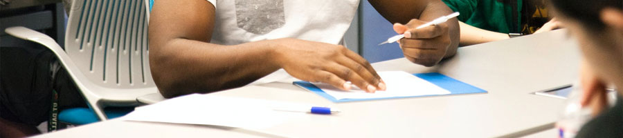 A male student on an analytical writing assessment