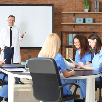 medical professor teaching his students