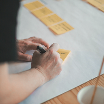 Placing sticky notes on white board