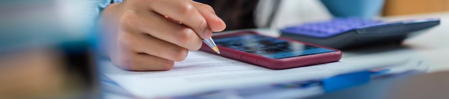 A woman writing the list of nouns