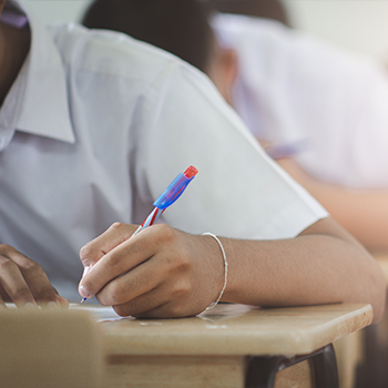 student sitting in a desk