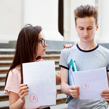 students looking at their test scores