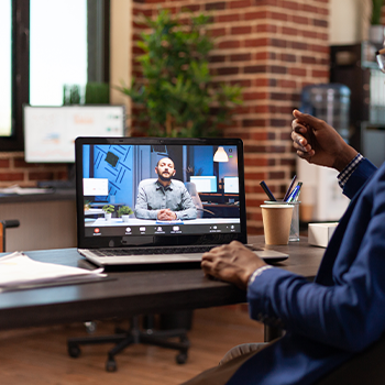 laptop screen with a live conference call