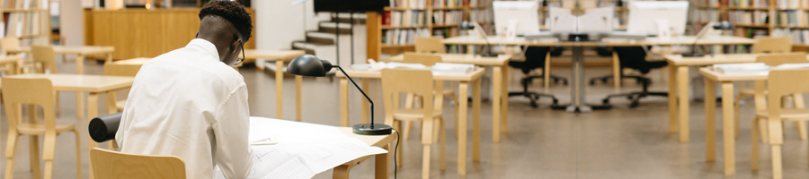 female student in an empty library