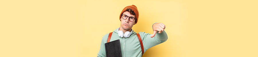 male student giving a thumbs down