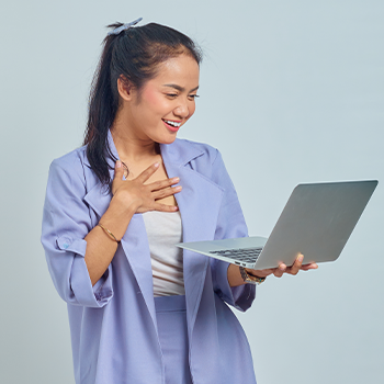 woman happy with her laptop